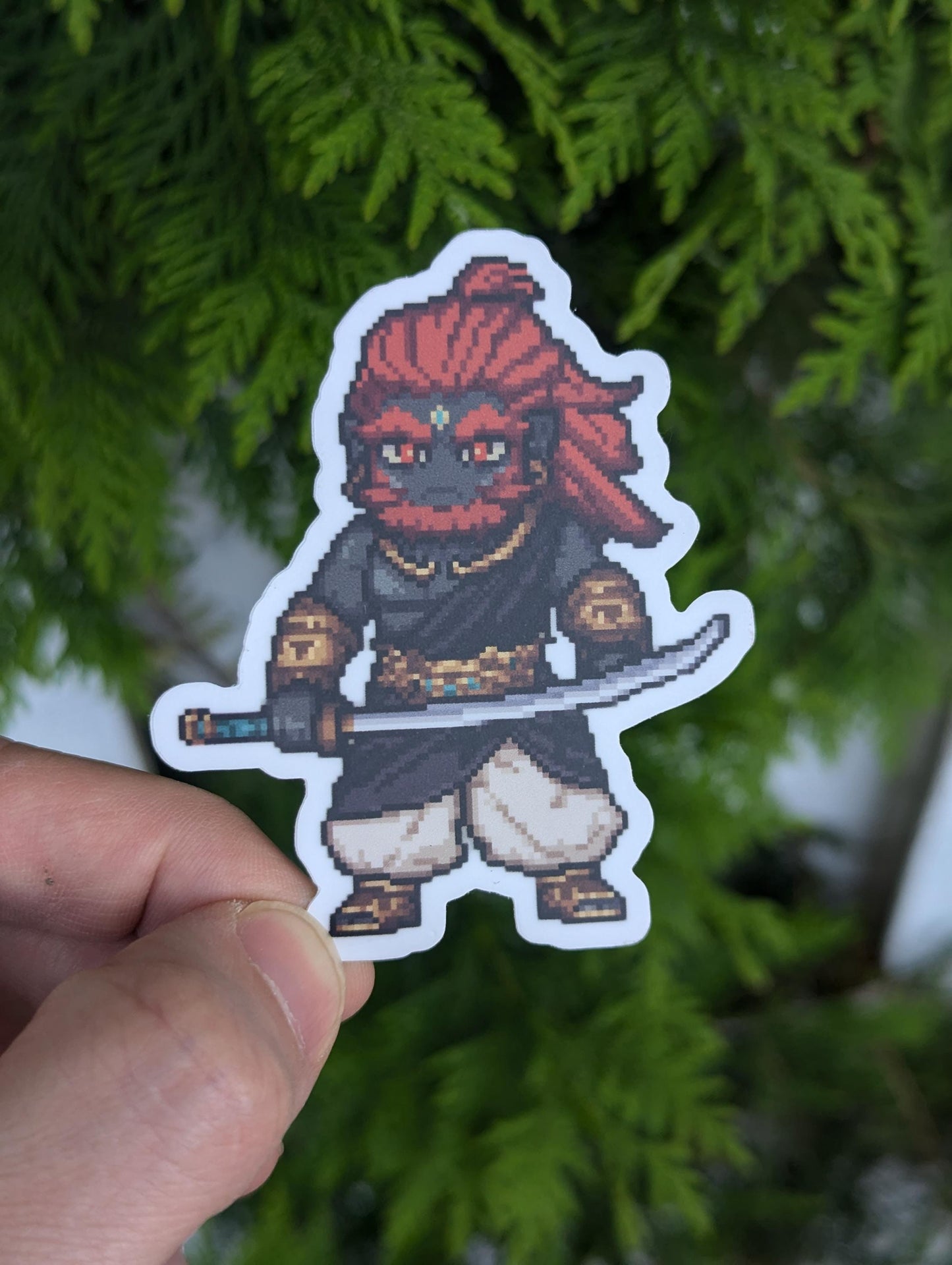 Chibi pixel-art depicting Ganondorf in dark armor with flowing red hair, brandishing a curved sword in a dynamic battle stance.